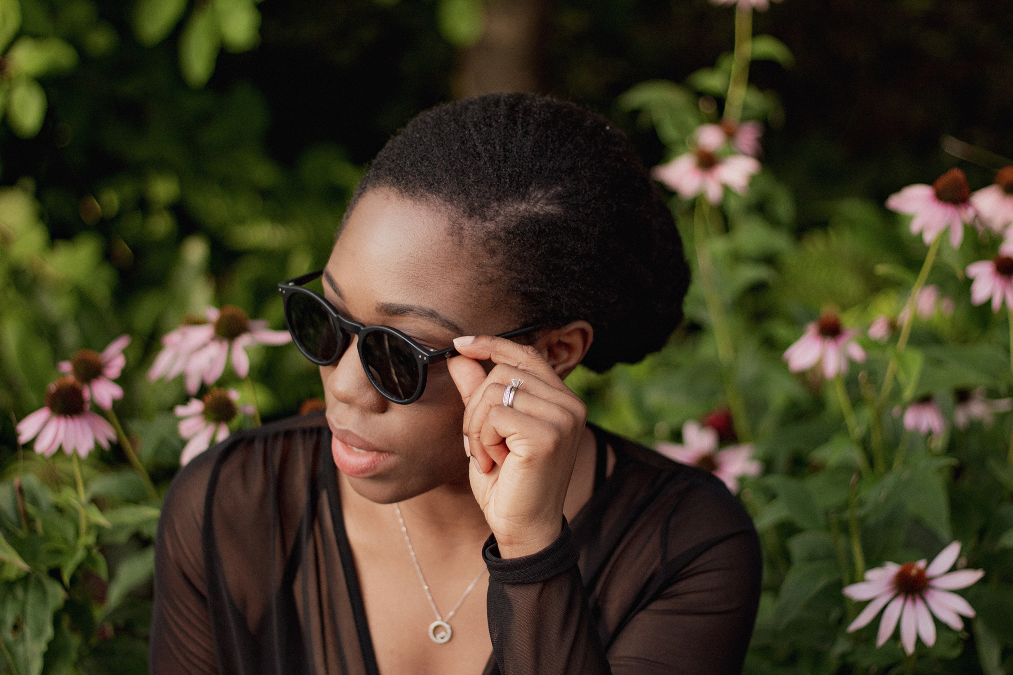 Black woman wearing sunglasses